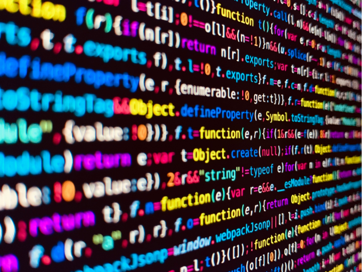 black screen with brightly colored text depicting various code